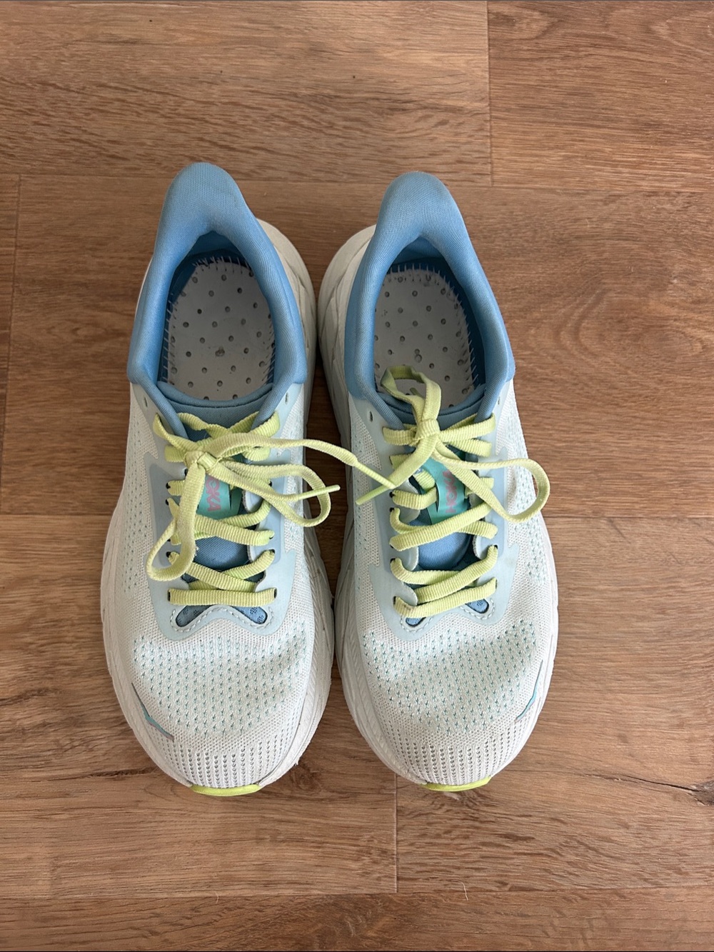 Hoka Running Shoes in Light Blue, Mint, and Pale Yellow